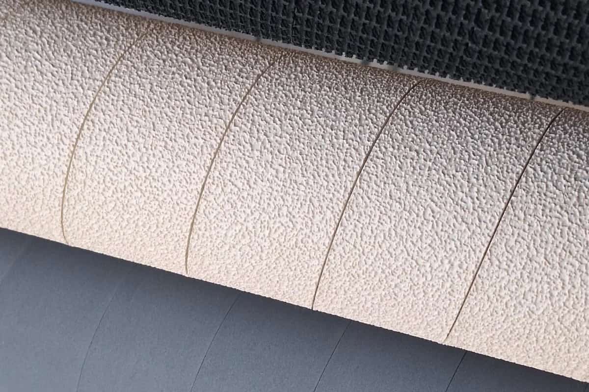 Herstellung von Textape-Bändern und -Bezügen für Walzen von Textilmaschinen
